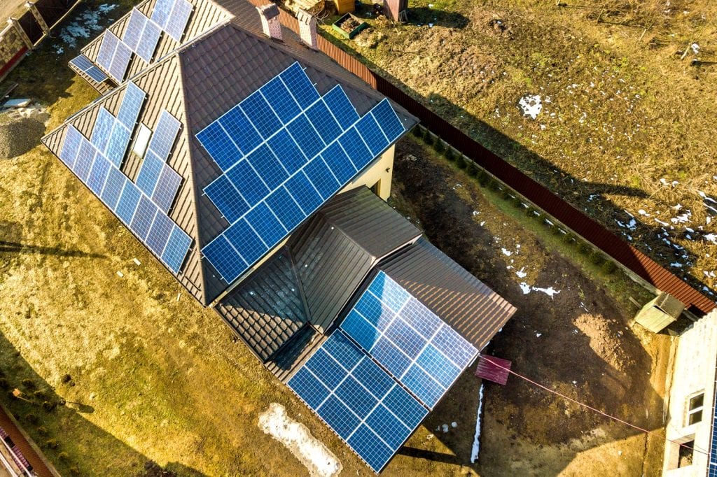 aerial top view of new modern residential house cottage with blu